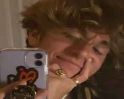 He has piercing in his ears and also loves to wear jewelry such as chain, rings and earrings He has piercing in his ears and also loves to wear jewelry such as chain, rings and earrings.